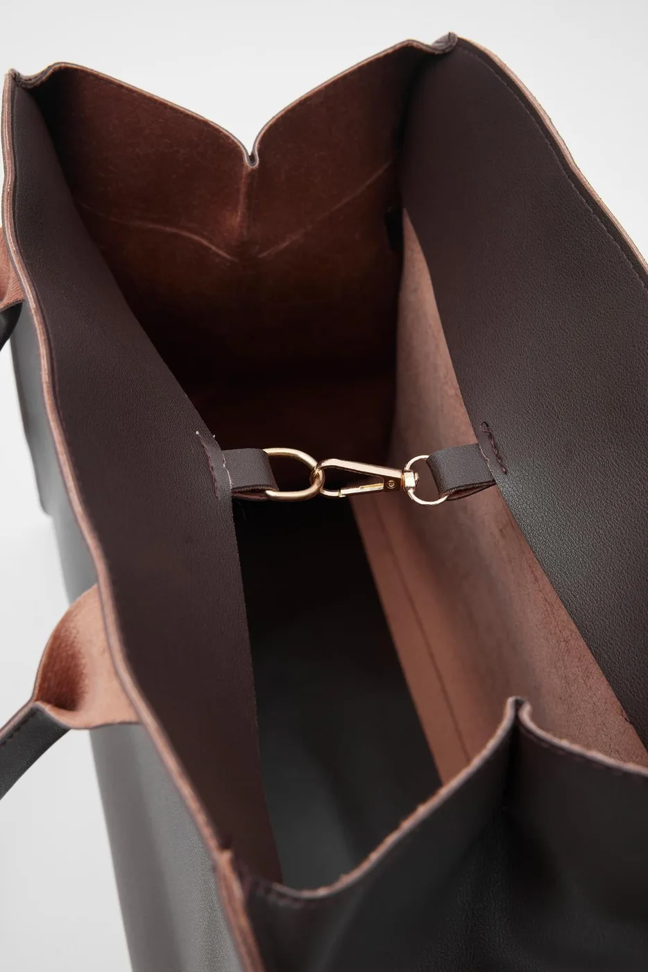 faux leather shoulder bag in dark brown
