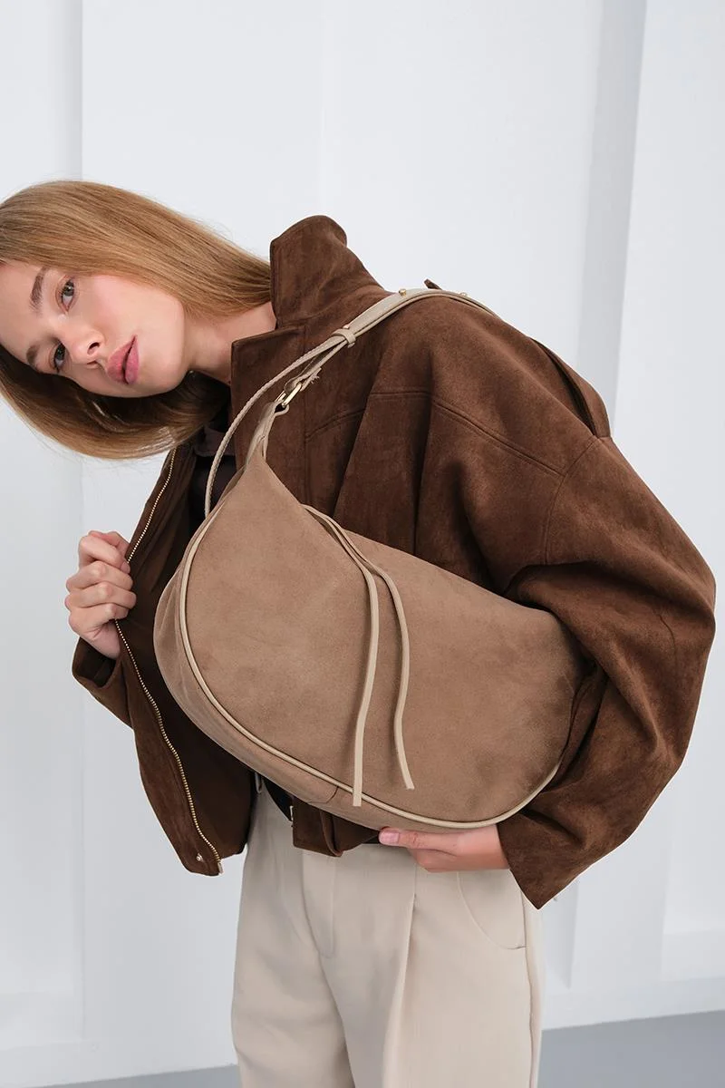 faux suede shoulder bag in taupe