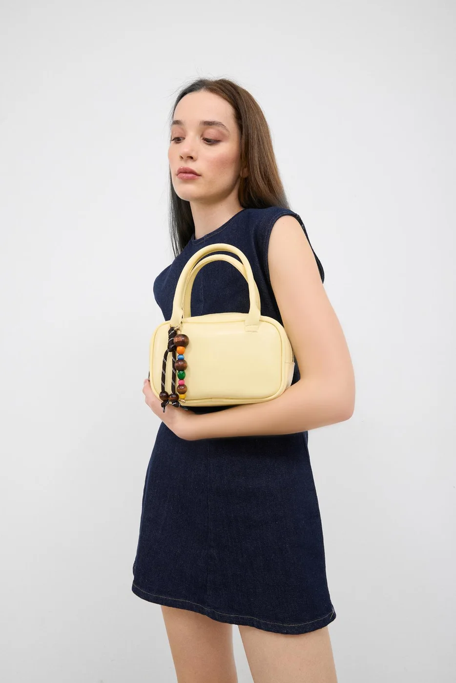 Faux leather crossbody bag in yellow