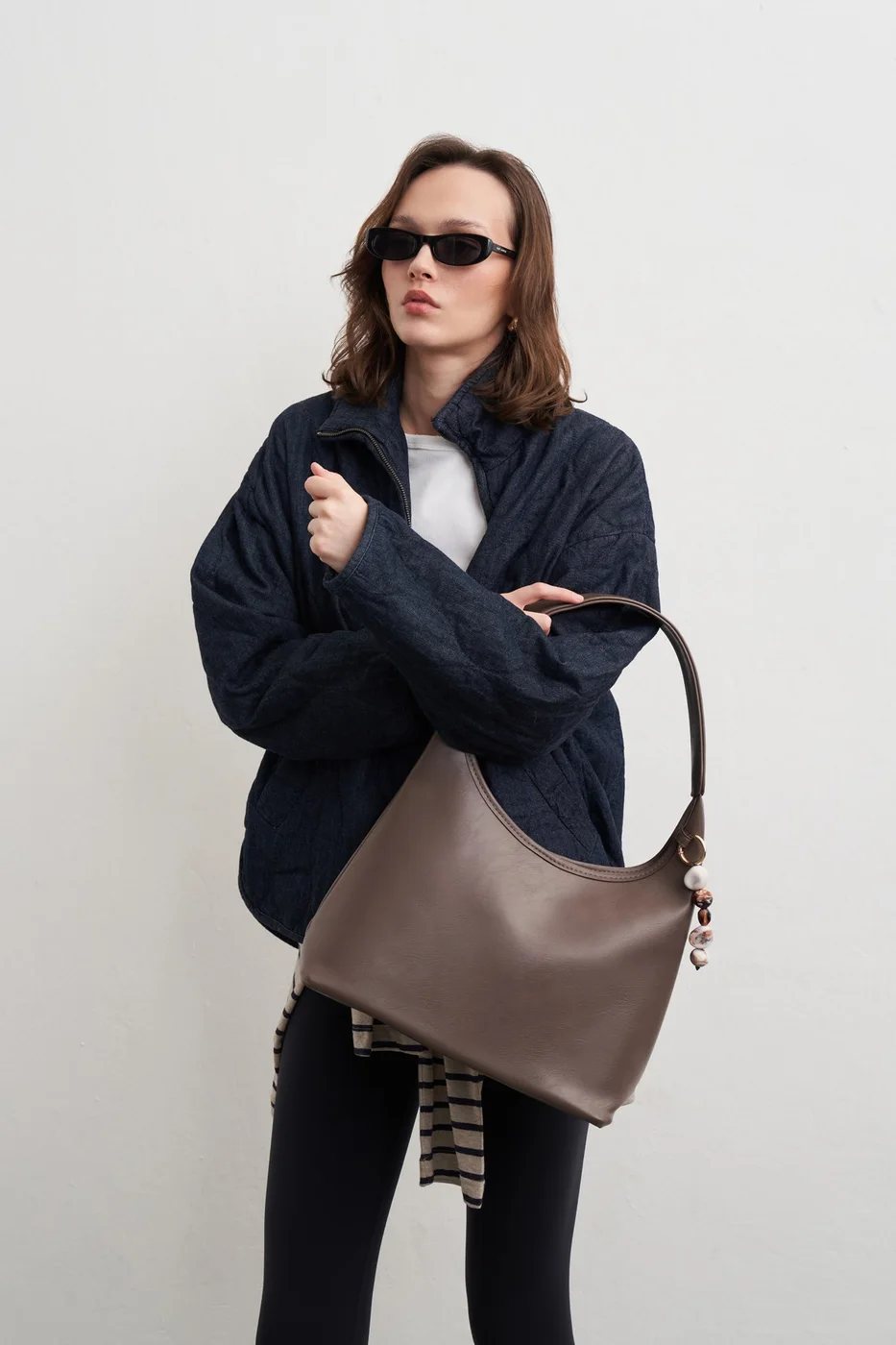 faux leather shoulder bag in taupe