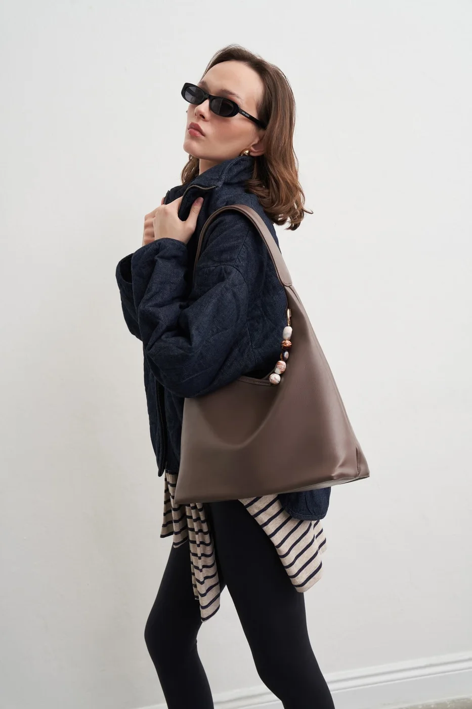 faux leather shoulder bag in taupe