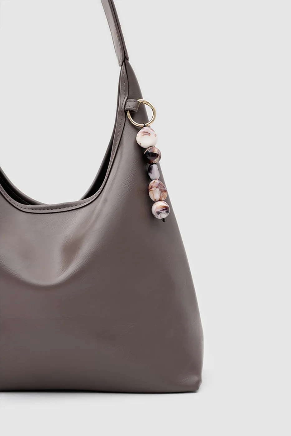 faux leather shoulder bag in taupe