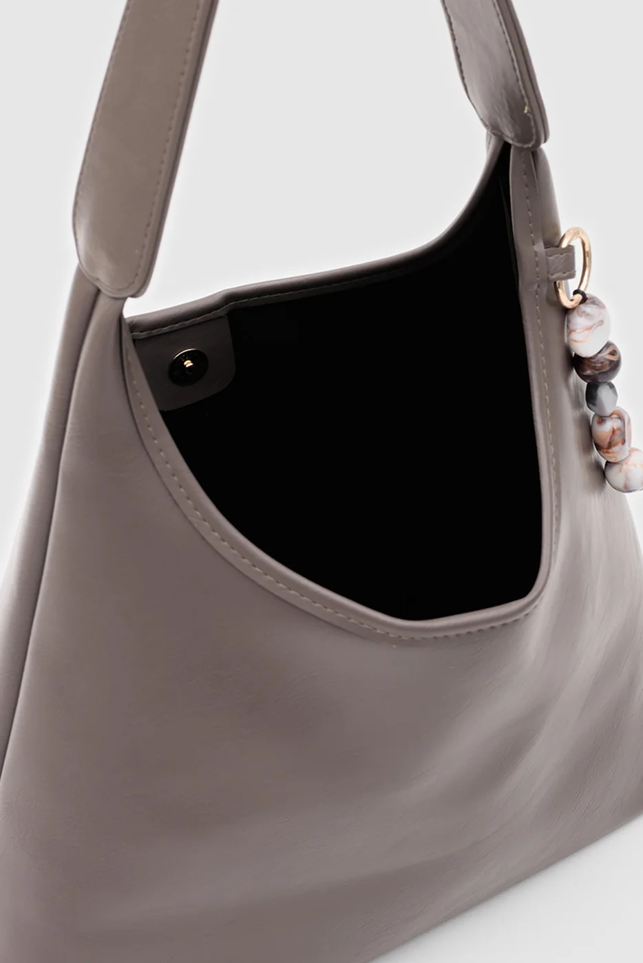faux leather shoulder bag in taupe