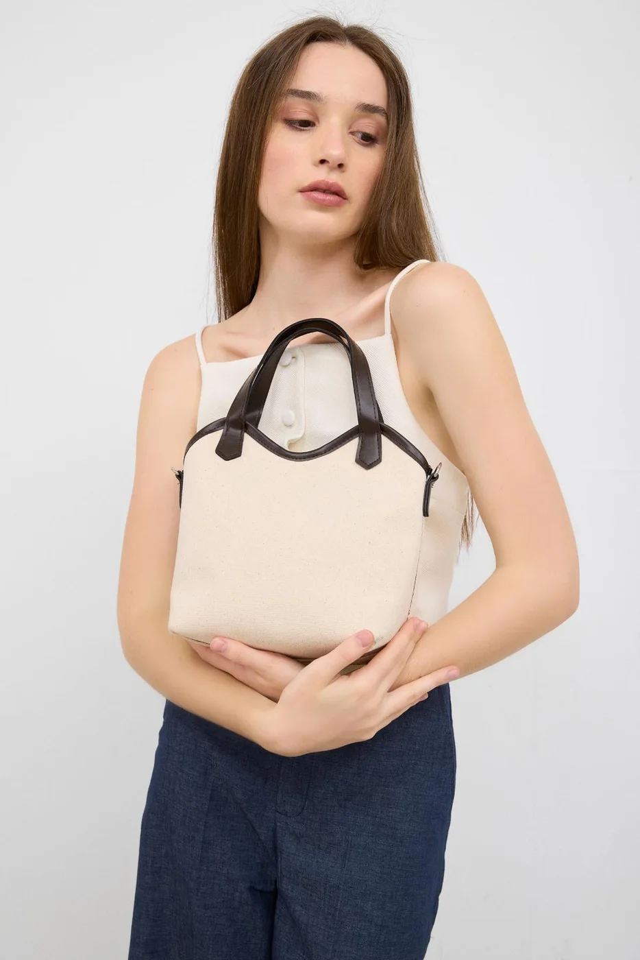 Faux leather shoulder bag design in brown