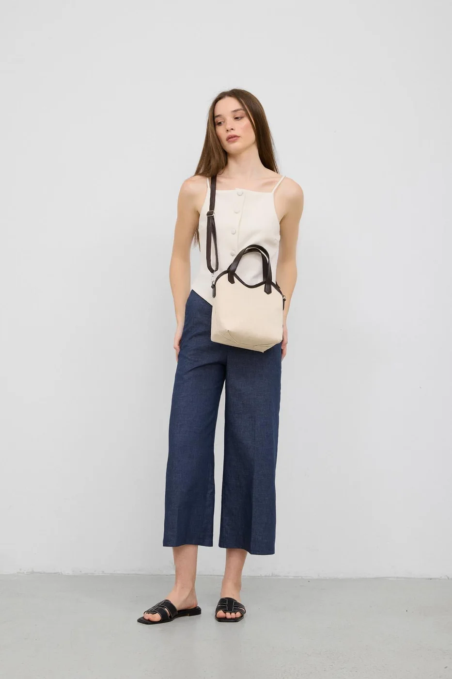Faux leather shoulder bag design in brown