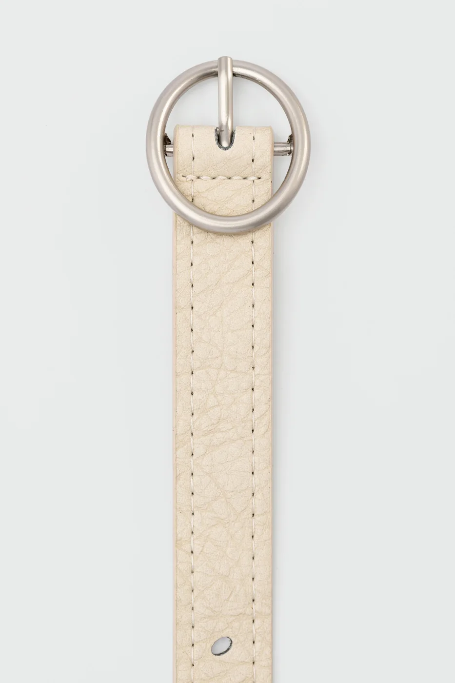 perforated faux leather belt in cream