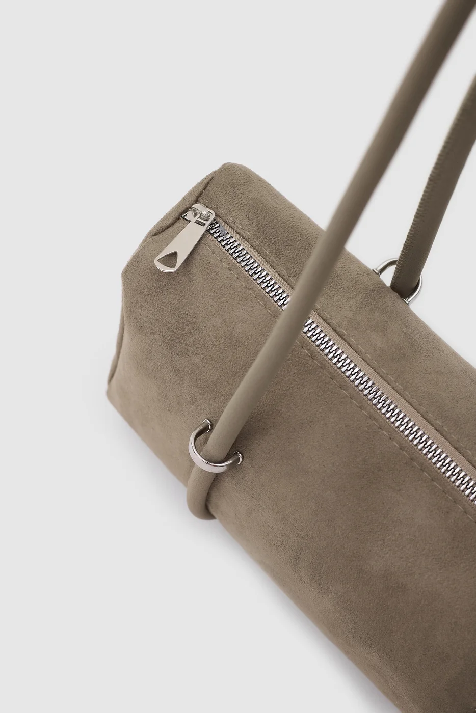 faux suede baguette bag in taupe