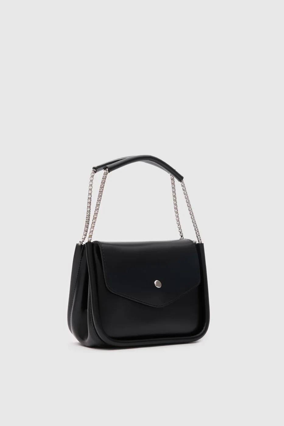 Faux leather crossbody bag with chain details Faux leather crossbody bag with chain details in black