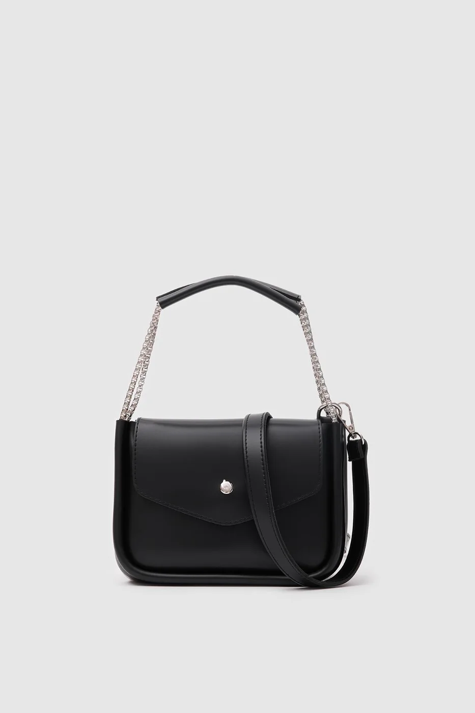 Faux leather crossbody bag with chain details Faux leather crossbody bag with chain details in black
