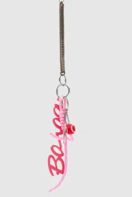 Bag charm featuring a tennis ball design