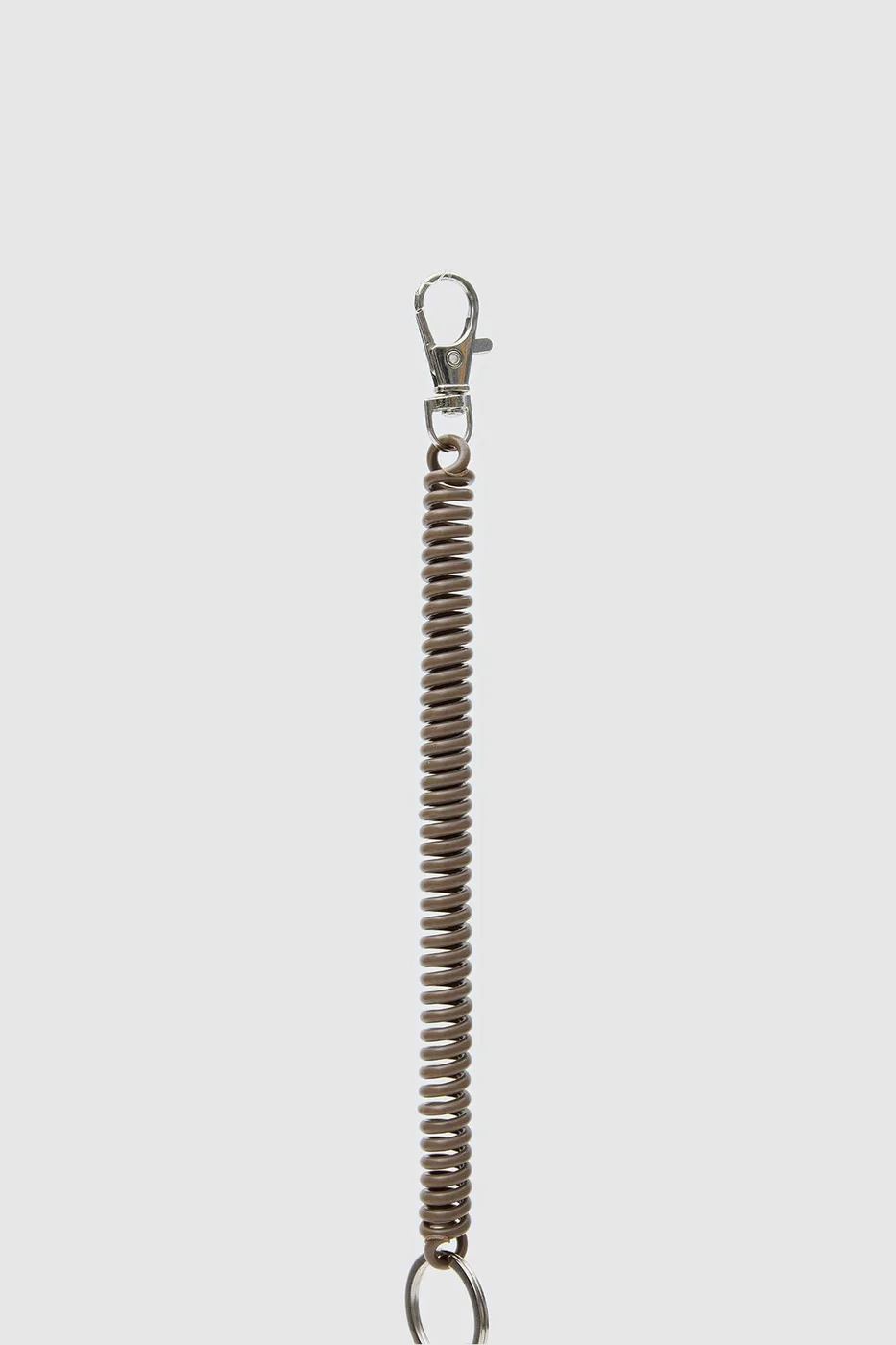 Bag charm featuring a tennis ball design
