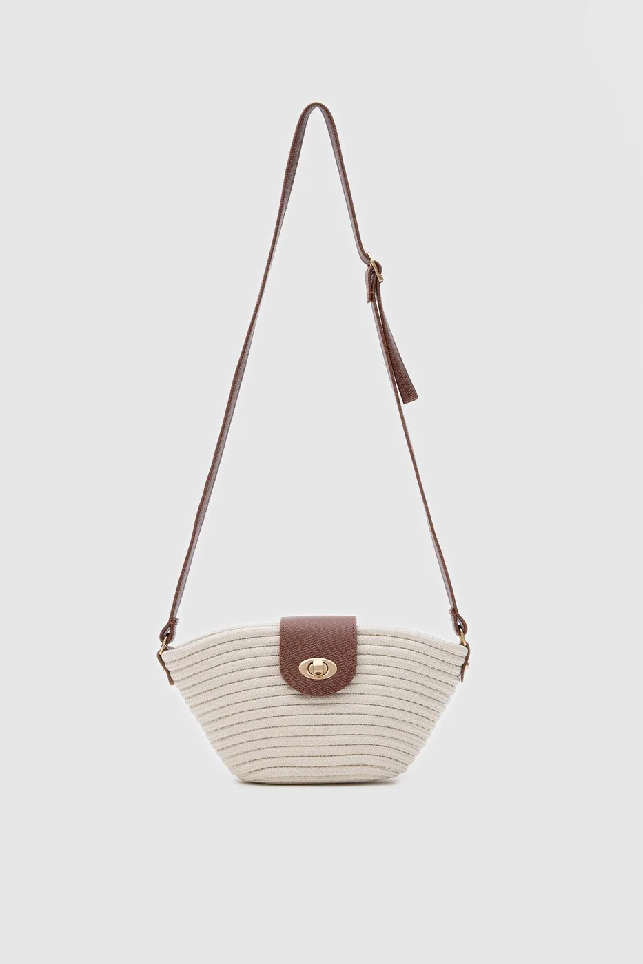 Woven crossbody bag in cream