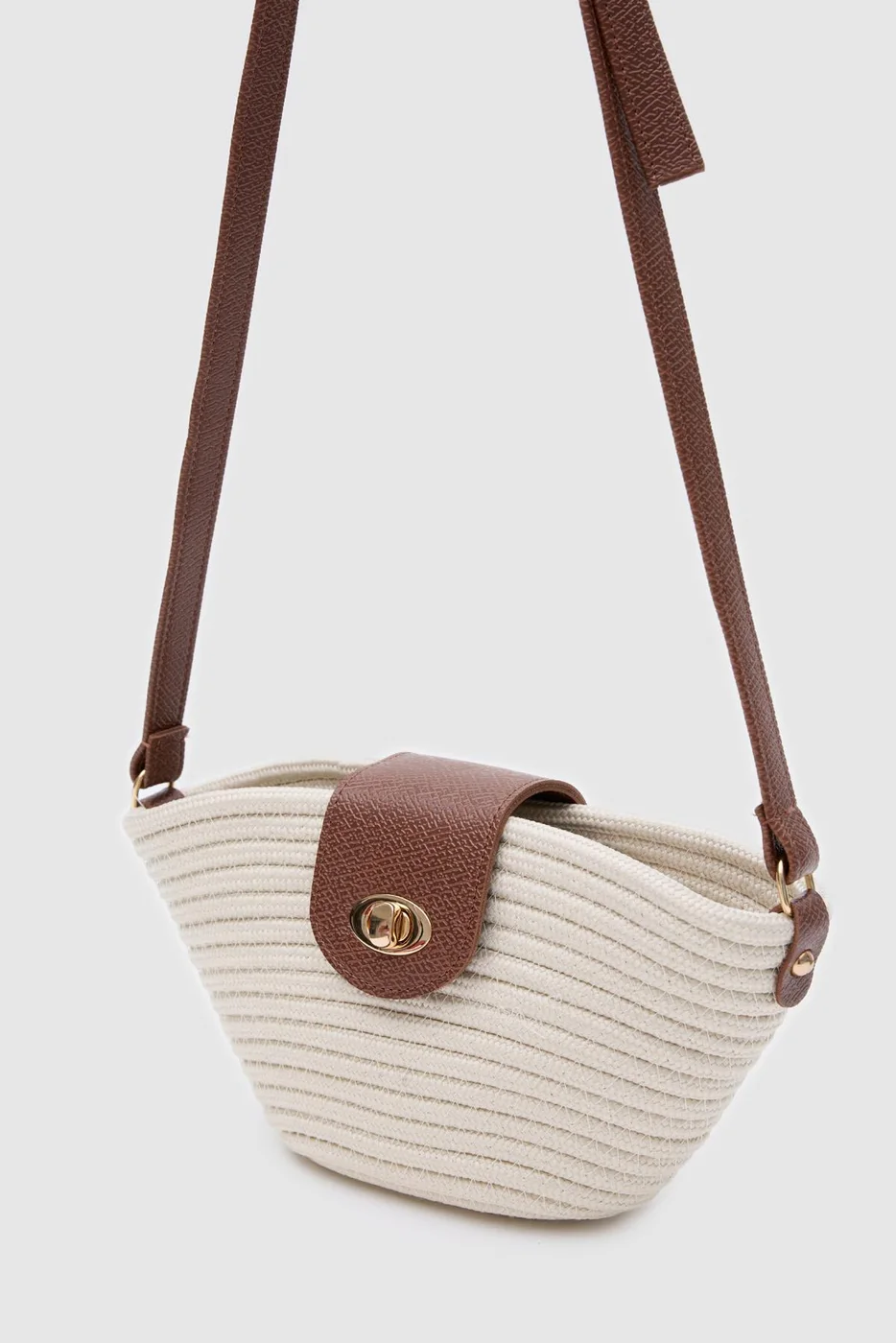 Woven crossbody bag in cream