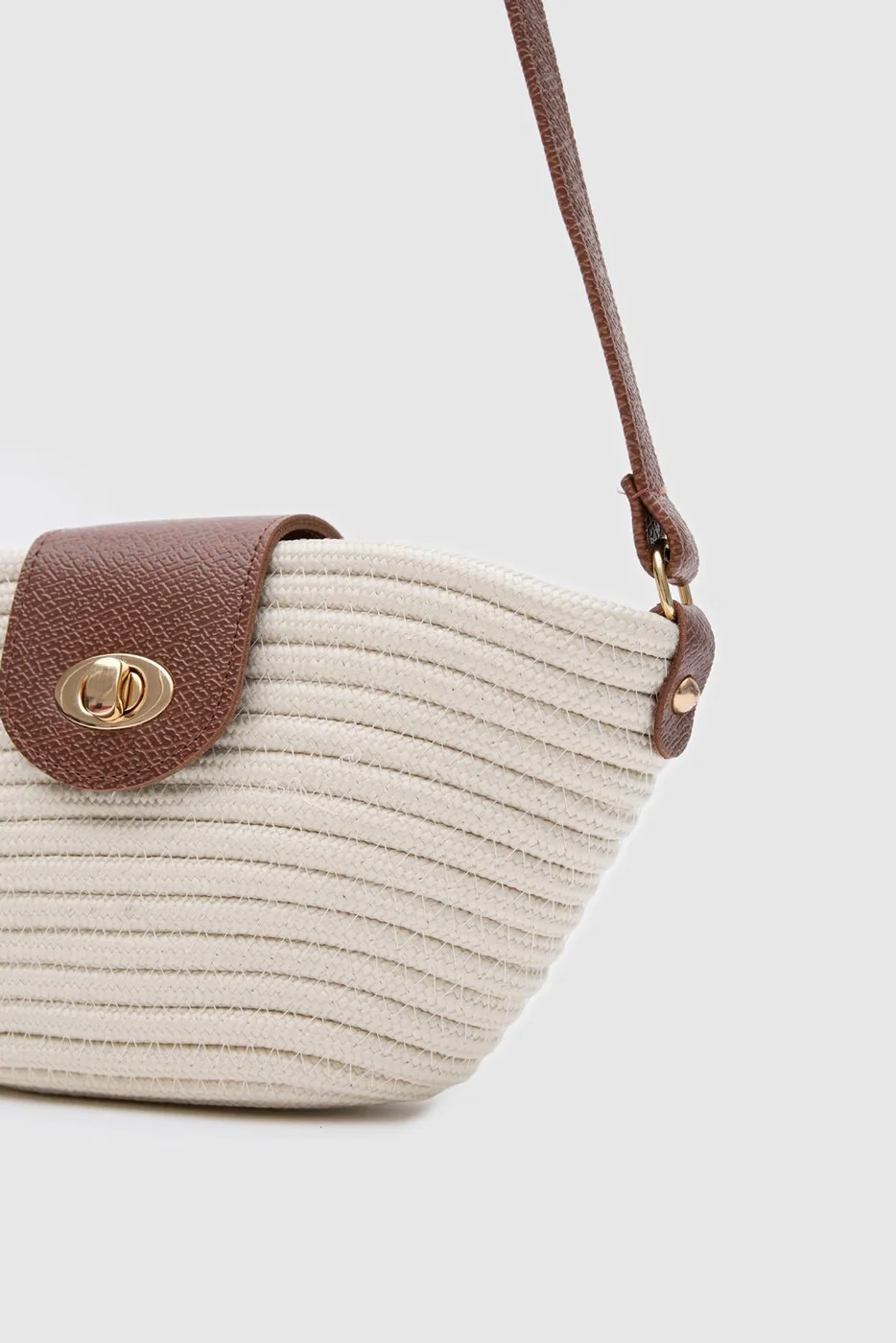 Woven crossbody bag in cream