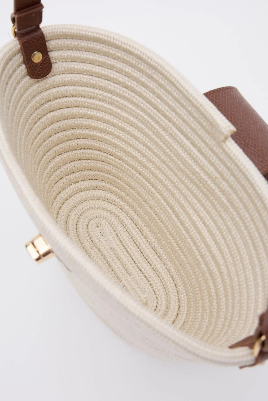 Woven crossbody bag in cream