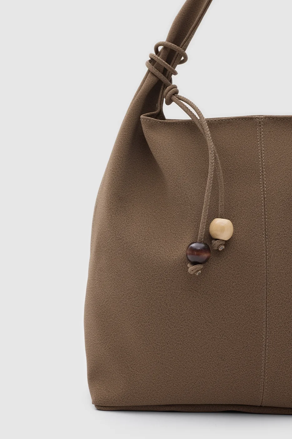 faux suede shoulder bag faux suede shoulder bag in taupe