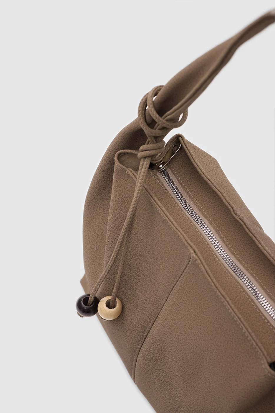 faux suede shoulder bag faux suede shoulder bag in taupe
