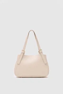 Faux leather shoulder bag design in cream