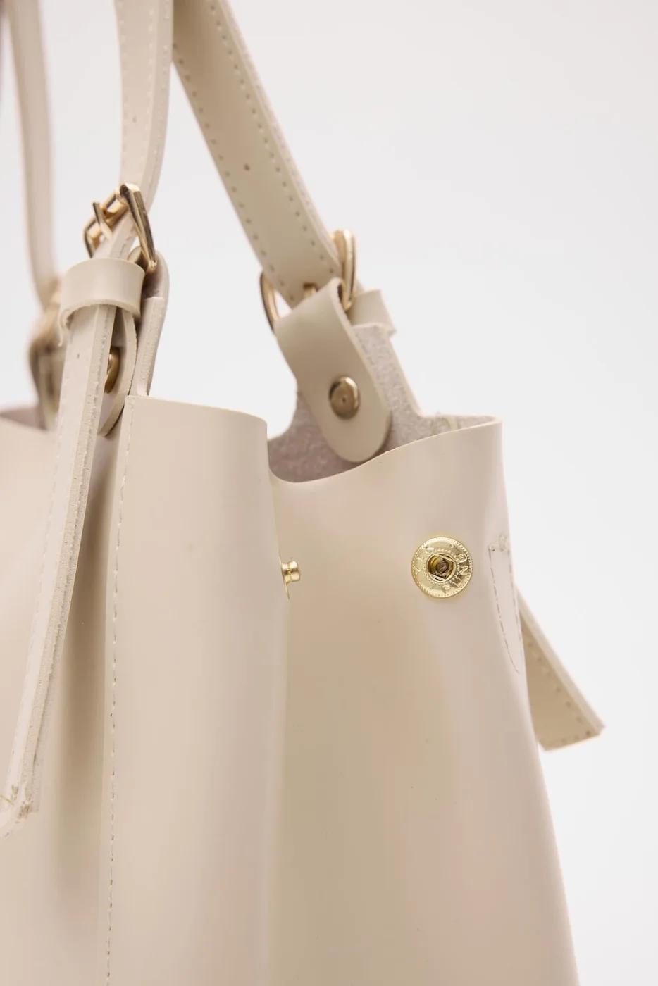 Faux leather shoulder bag design Faux leather shoulder bag design in cream