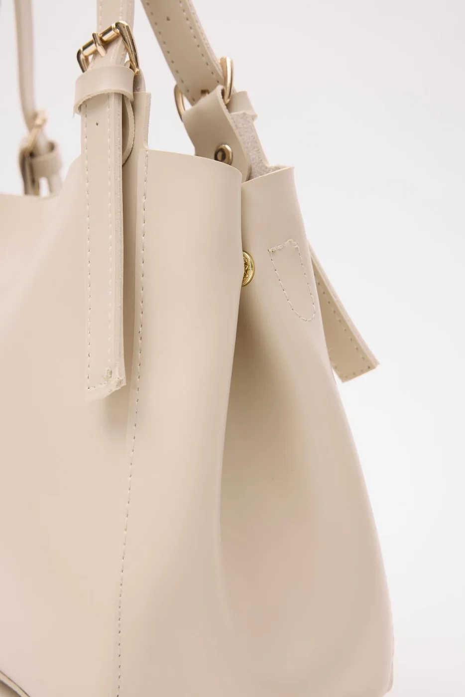 Faux leather shoulder bag design Faux leather shoulder bag design in cream