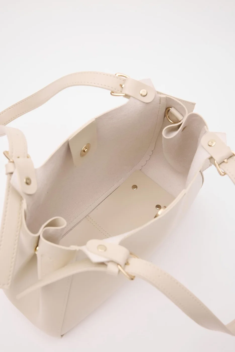 Faux leather shoulder bag design Faux leather shoulder bag design in cream