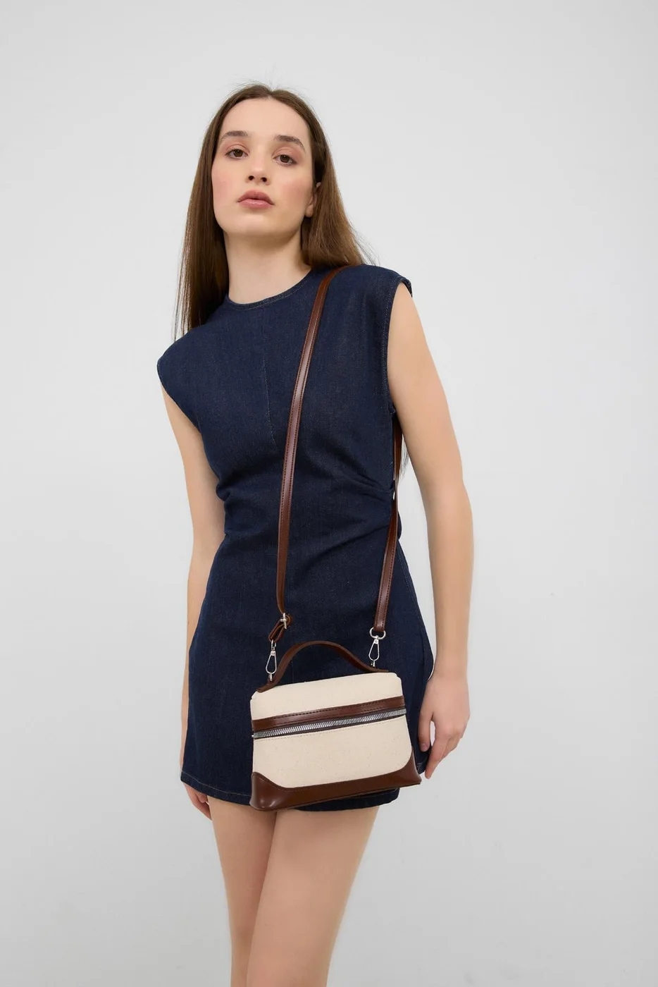 faux leather crossbody bag in cream-tan