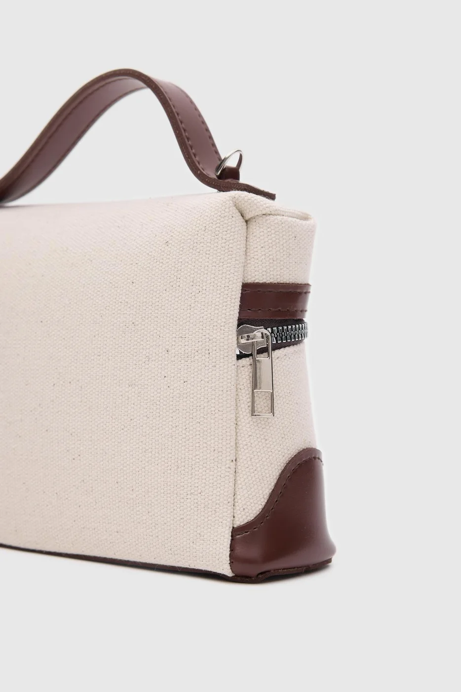 faux leather crossbody bag in cream-tan