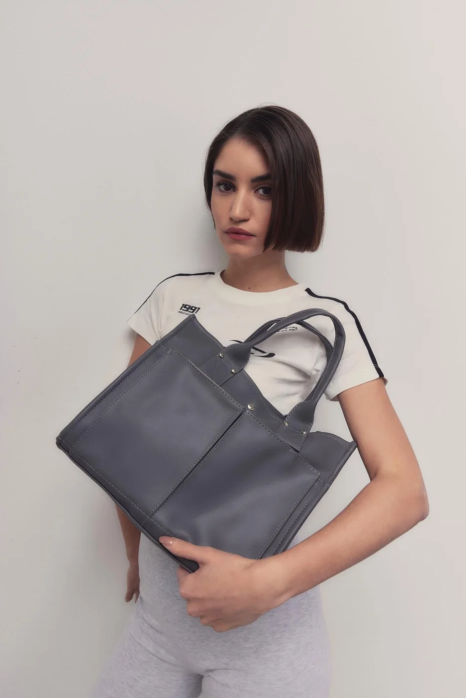 faux leather shoulder bag in charcoal